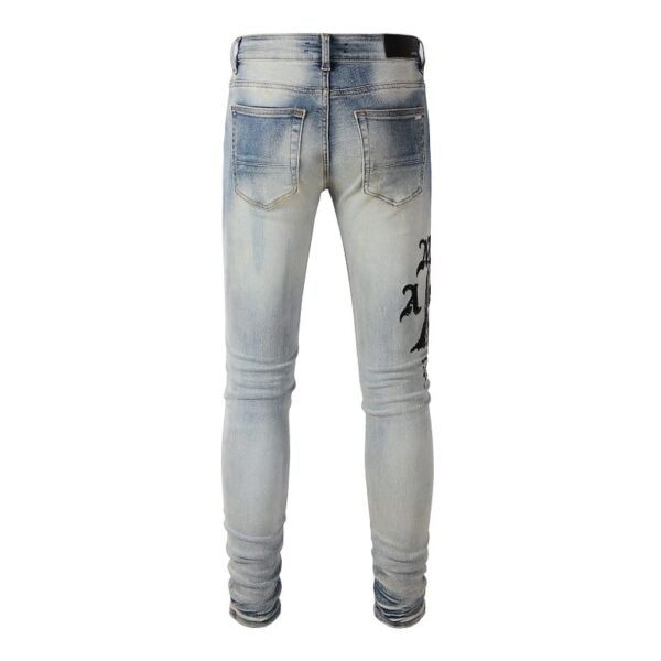 Calça Amiri Jeans Skinny com Caveira Estapada "Azul"" - Imagem 2